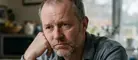 Man feeling unhappy